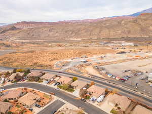 Aerial view of property's location featuring mountains