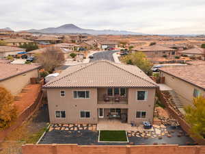 Aerial view of residential area with a mountainous background