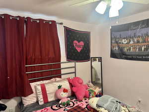 Bedroom featuring ceiling fan