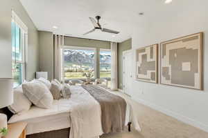 Bedroom with a mountain view, carpet flooring, a ceiling fan, and recessed lighting