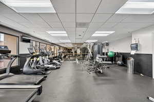 Gym featuring a drop ceiling