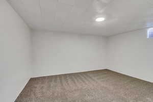 View of carpeted spare room