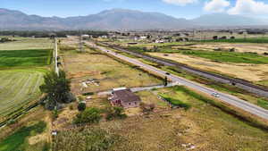 Overview of rural landscape with a mountain backdrop