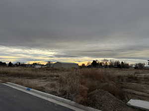 View of asphalt street with curbs