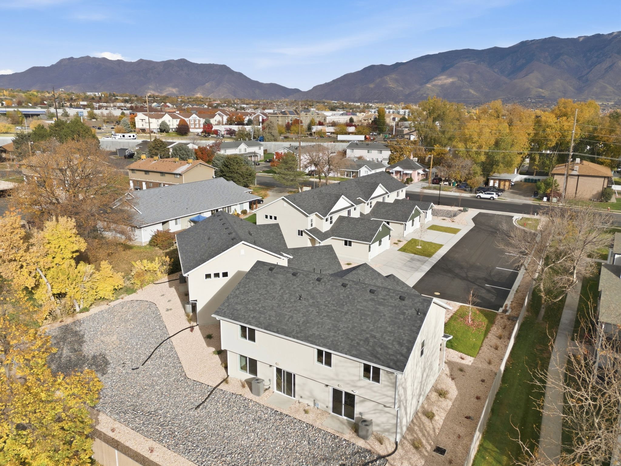 Aerial perspective of suburban area featuring mountains