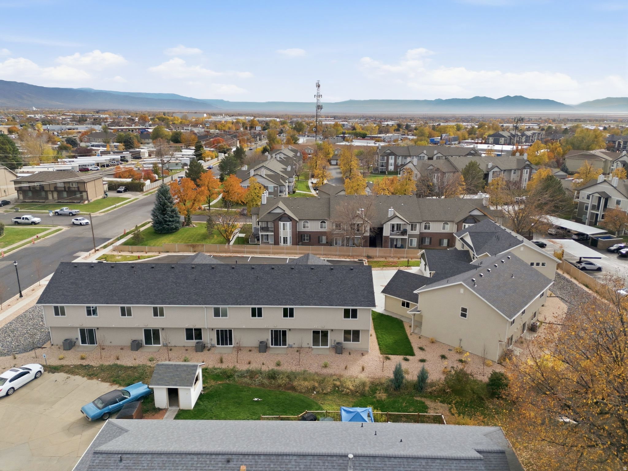 Aerial perspective of suburban area with mountains