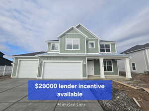 View of front of house with a standing seam roof, a porch, a metal roof, board and batten siding, and driveway