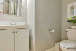 Half bath with toilet and vanity