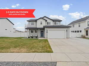 View of front facade with concrete driveway, a gate, and a garage