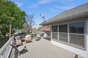 Wooden terrace with an outdoor hangout area