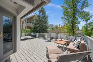 Wooden deck with an outdoor hangout area
