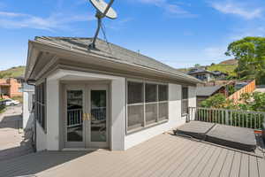 Wooden terrace with french doors
