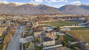 View of property location with nearby suburban area and mountains
