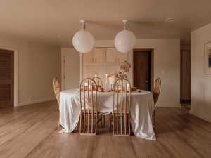 Dining room featuring wood finished floors