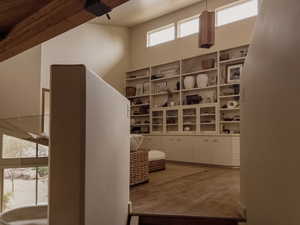 Walk in closet featuring a high ceiling