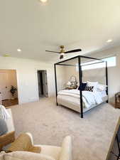 Carpeted bedroom with recessed lighting and a ceiling fan