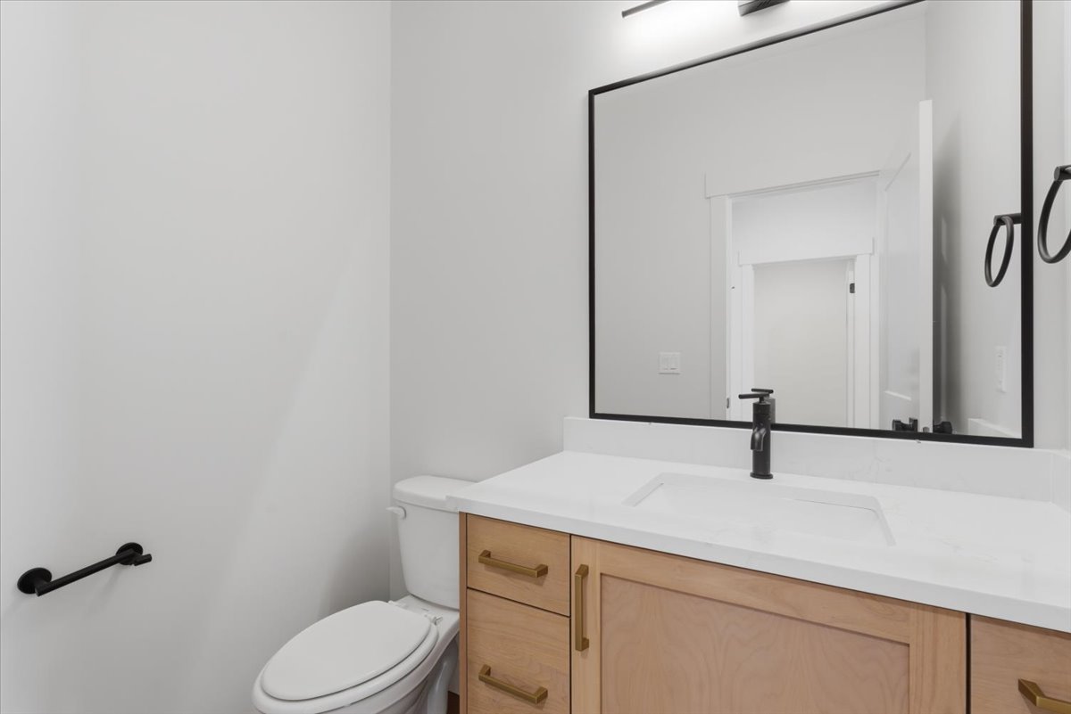 Bathroom with vanity and toilet