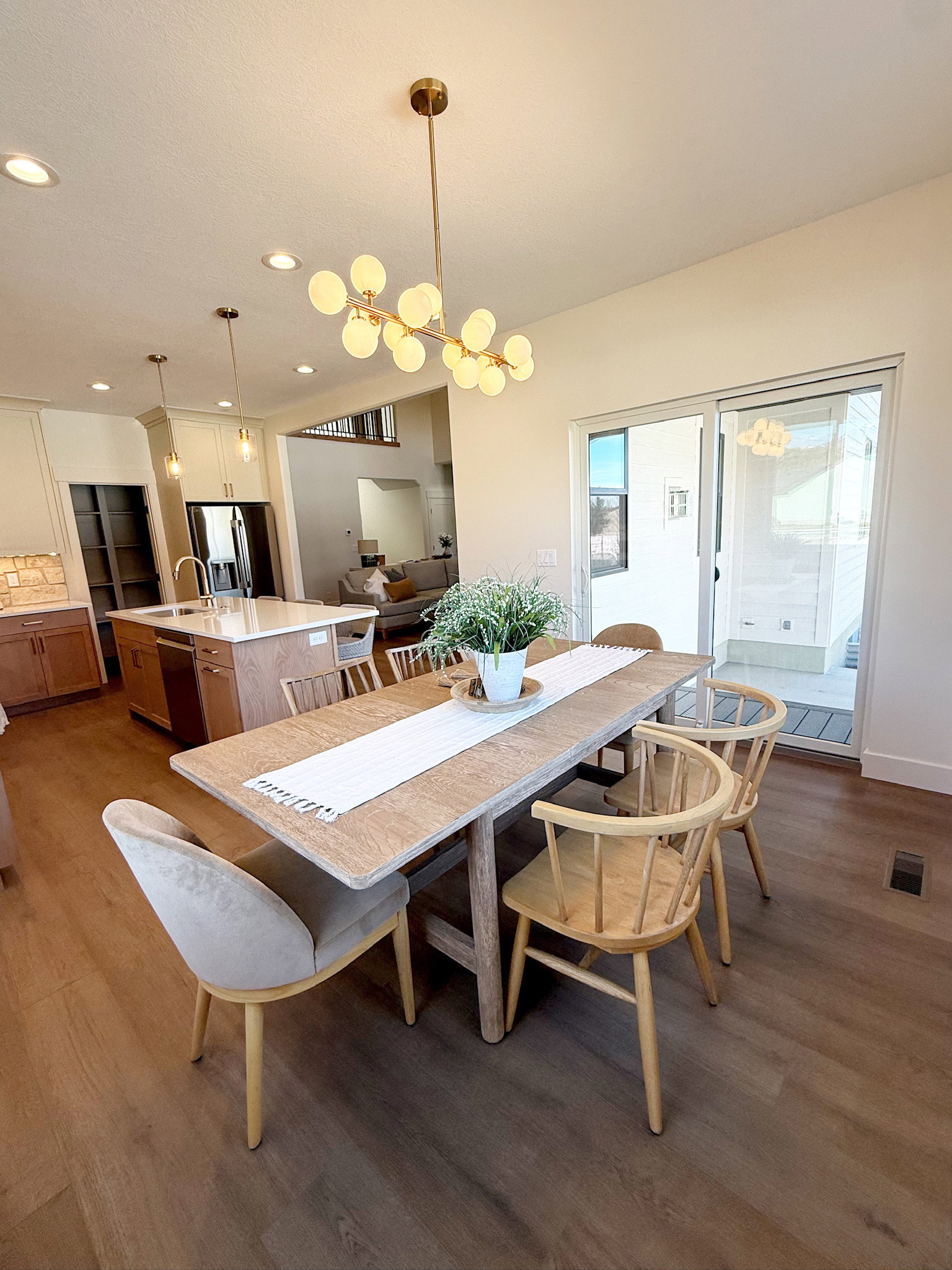 Dining space featuring dark wood finished floors and recessed lighting