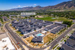 Aerial view of residential area featuring a mountainous background