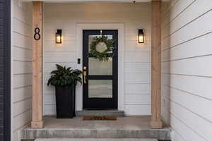 Property entrance with a porch