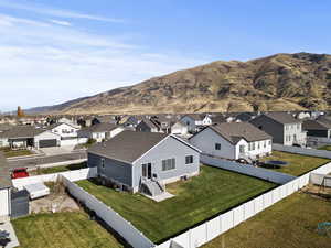 Aerial view of residential area with mountains