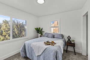 Bedroom featuring carpet flooring