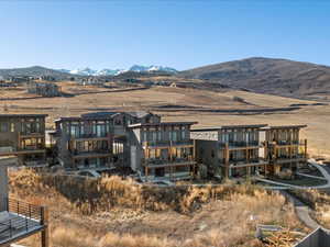 Back of house with a mountain view