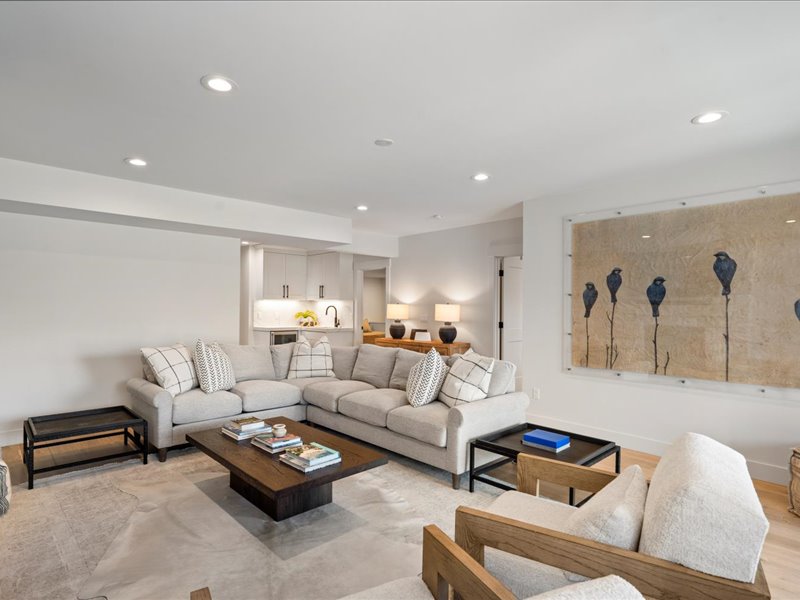Living area with recessed lighting and wood finished floors