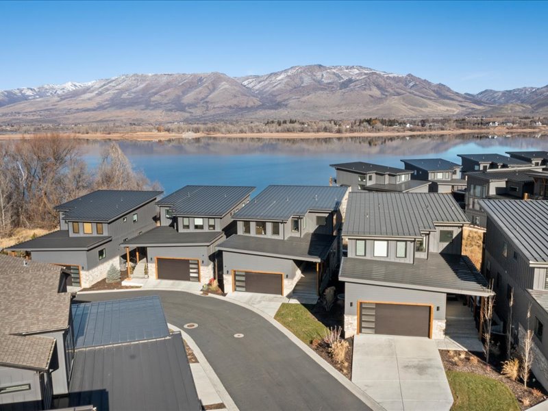Aerial view of residential area with a water and mountain view