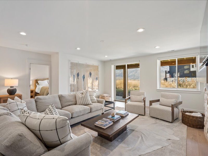 Living area with recessed lighting and wood finished floors