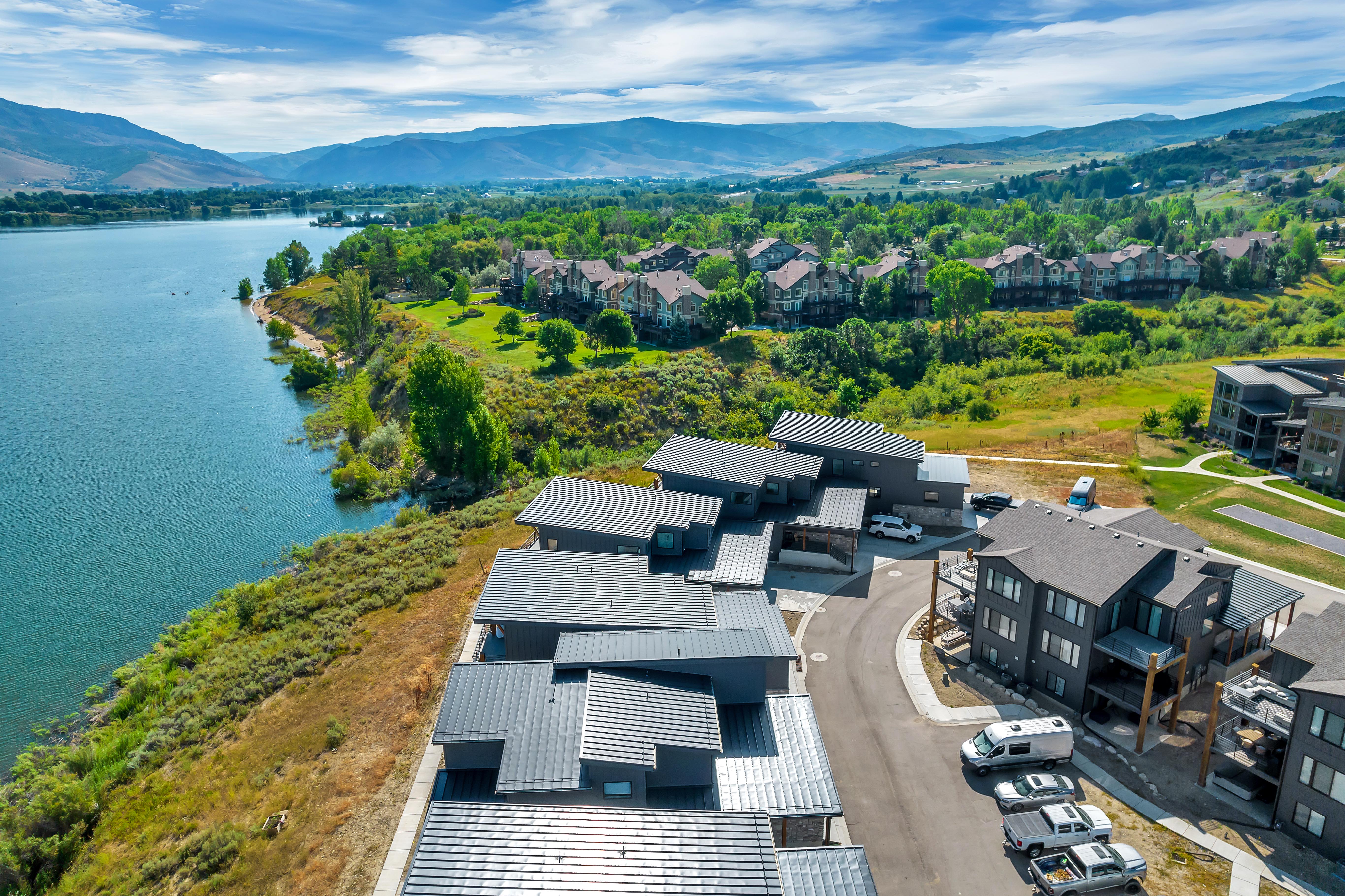 Aerial view of residential area with a water and mountain view