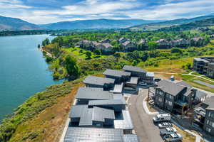 Aerial view of residential area with a water and mountain view
