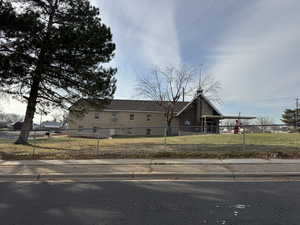 View of front of home with a fenced front yard