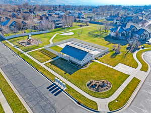Aerial perspective of pool house / pool area and park