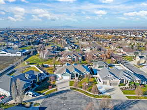 Aerial view of community with a mountain backdrop