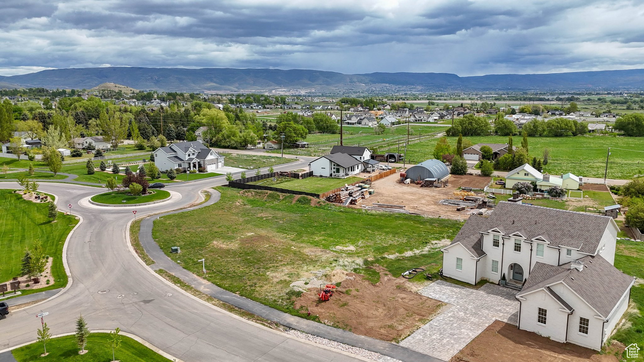 Aerial view of residential area with mountains