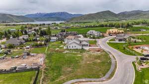Aerial view of residential area with a mountainous background