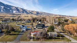 Aerial view of residential area featuring mountains