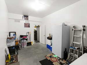 Miscellaneous room featuring concrete floors