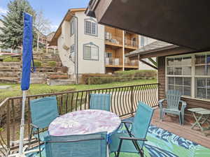 Wooden terrace with outdoor dining space