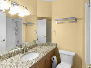 Bathroom with vanity and tub / shower combination