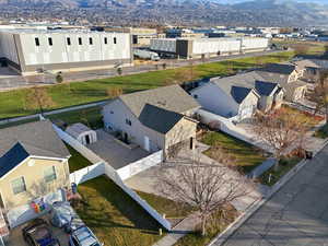 Aerial perspective of suburban area featuring a mountain backdrop