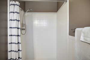 Bathroom featuring a stall shower