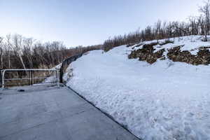 View of yard layered in snow