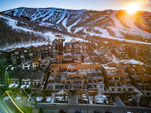 Snowy aerial view with a mountain view