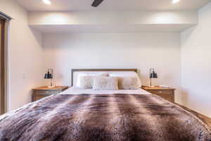 Unfurnished bedroom with recessed lighting and ceiling fan