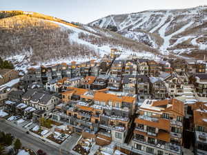 Snowy aerial view with a mountain view
