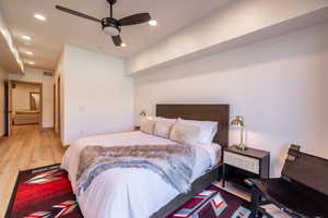 Bedroom with recessed lighting, wood finished floors, and ceiling fan