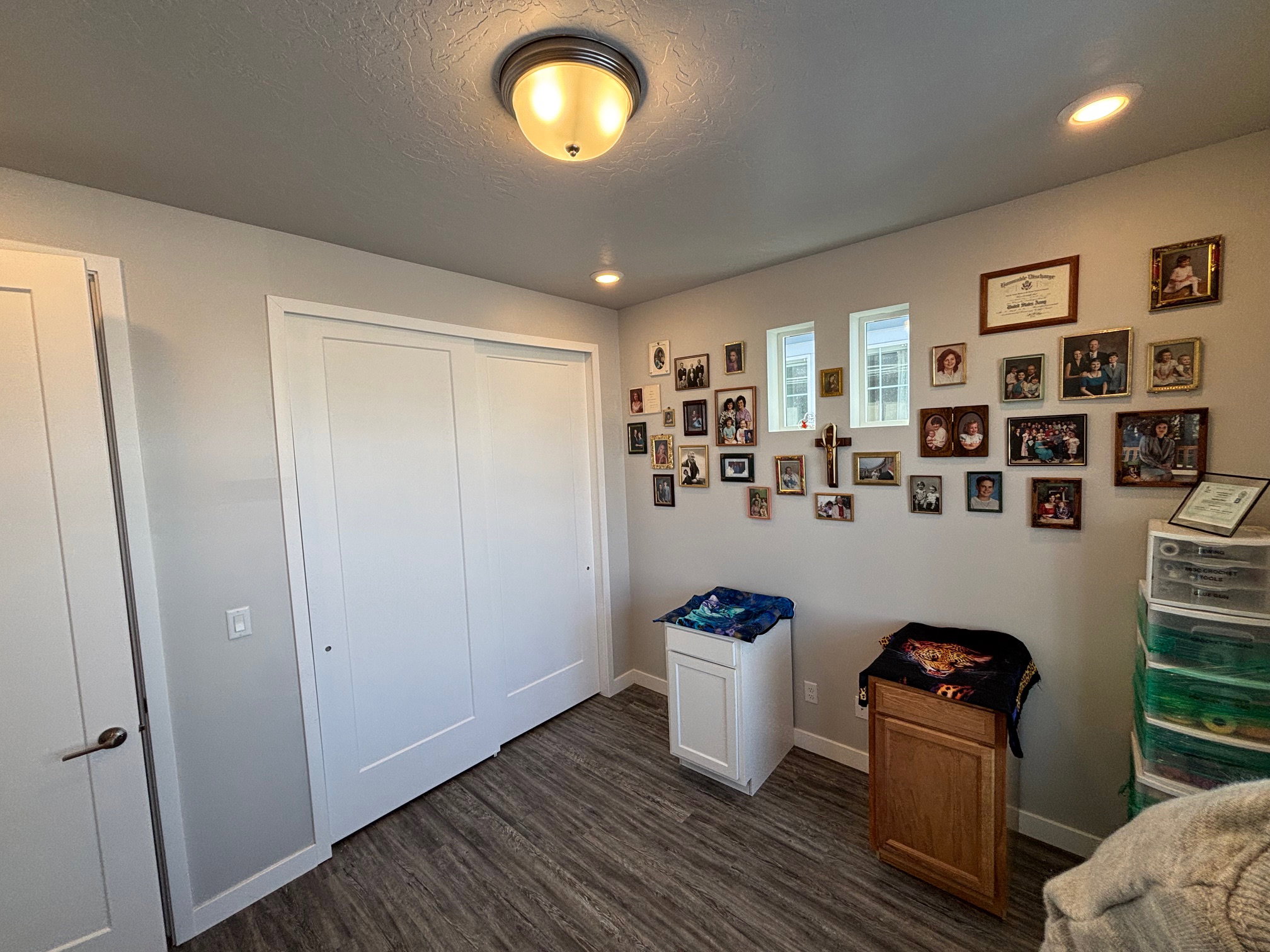 Bedroom featuring a closet, dark wood-type flooring, recessed lighting, and a textured ceiling