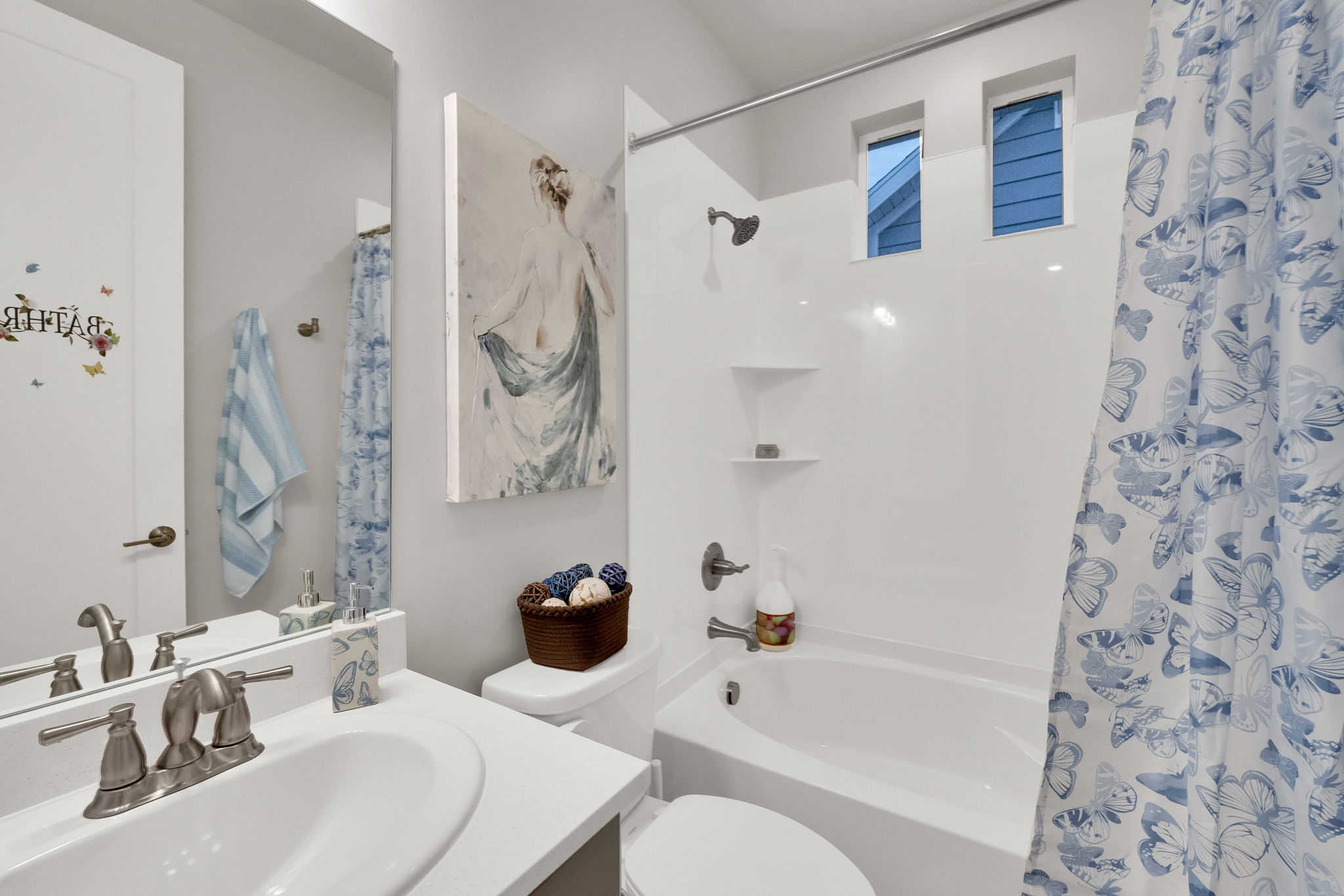 Full bathroom with vanity and shower / bath combination with curtain